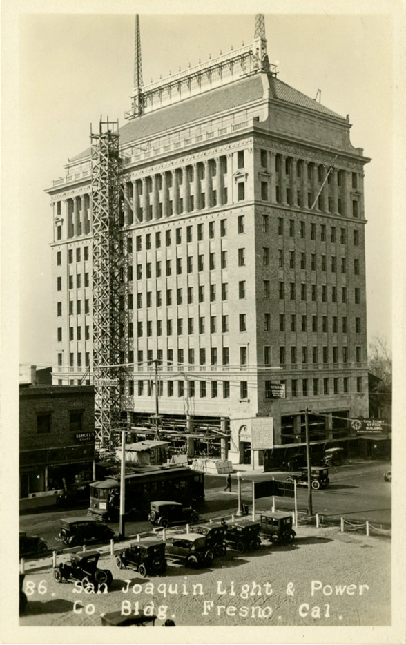 Image description: A historic 11-story high-rise building located in downtown Fresno, California, known as the San Joaquin Light and Power Corporation Building. The building stands tall at 52.8 meters (173 feet). It was completed in 1923 for the San Joaquin Light and Power Corporation, which later evolved into the Pacific Gas and Electric Company. The chief designer responsible for its creation was Raymond R. Shaw from the R.F. Felchlin Company. The architectural structure is an iconic landmark of the city, ranking as the fourth tallest building in Fresno. Over the years, the building has undergone changes, and it now houses two event spaces—one on the first floor and another on the 10th floor. The building's rich history and enduring presence make it a significant part of Fresno's skyline