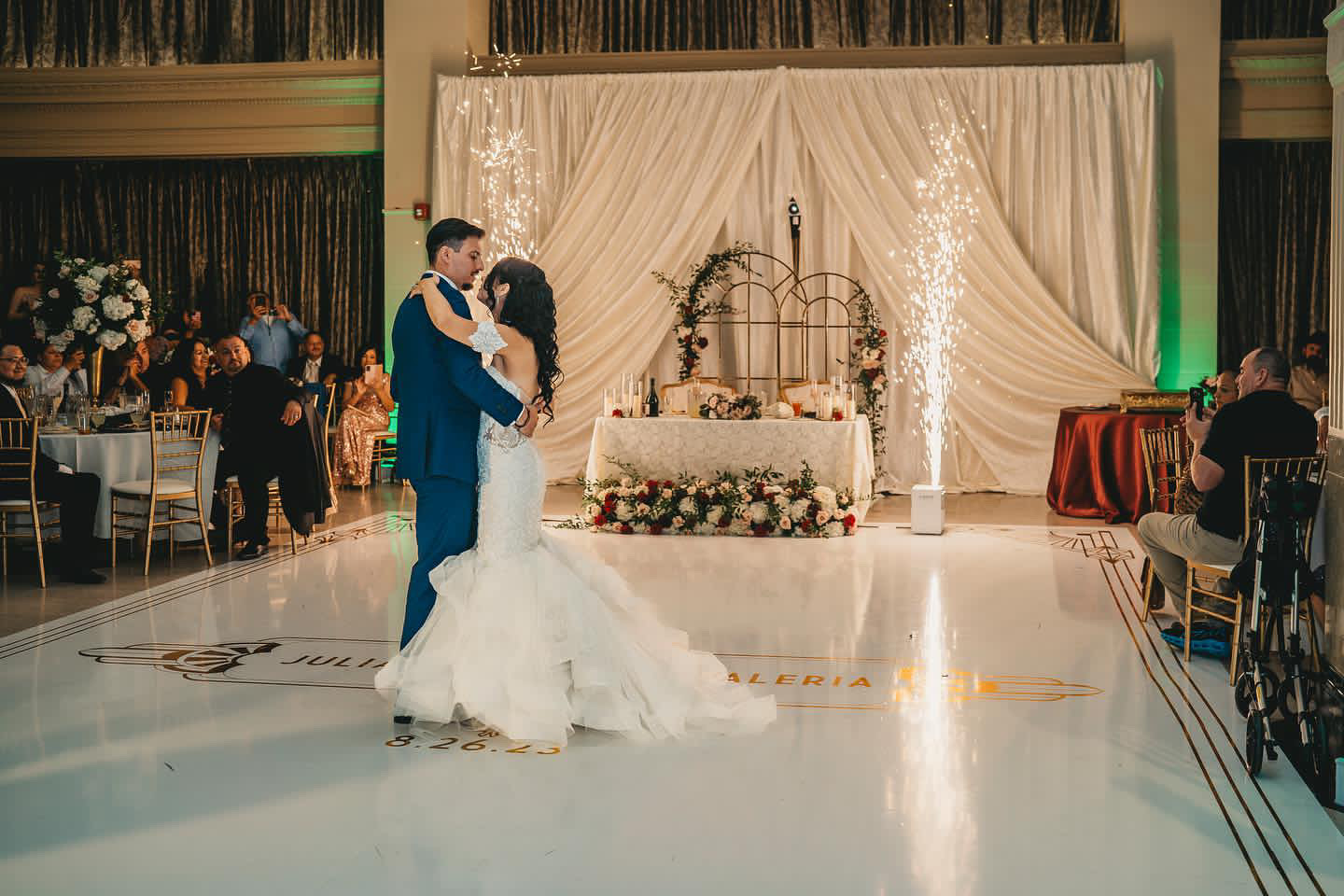 Newlyweds share first dance in event venue located in Downtown Fresno with sparklers!